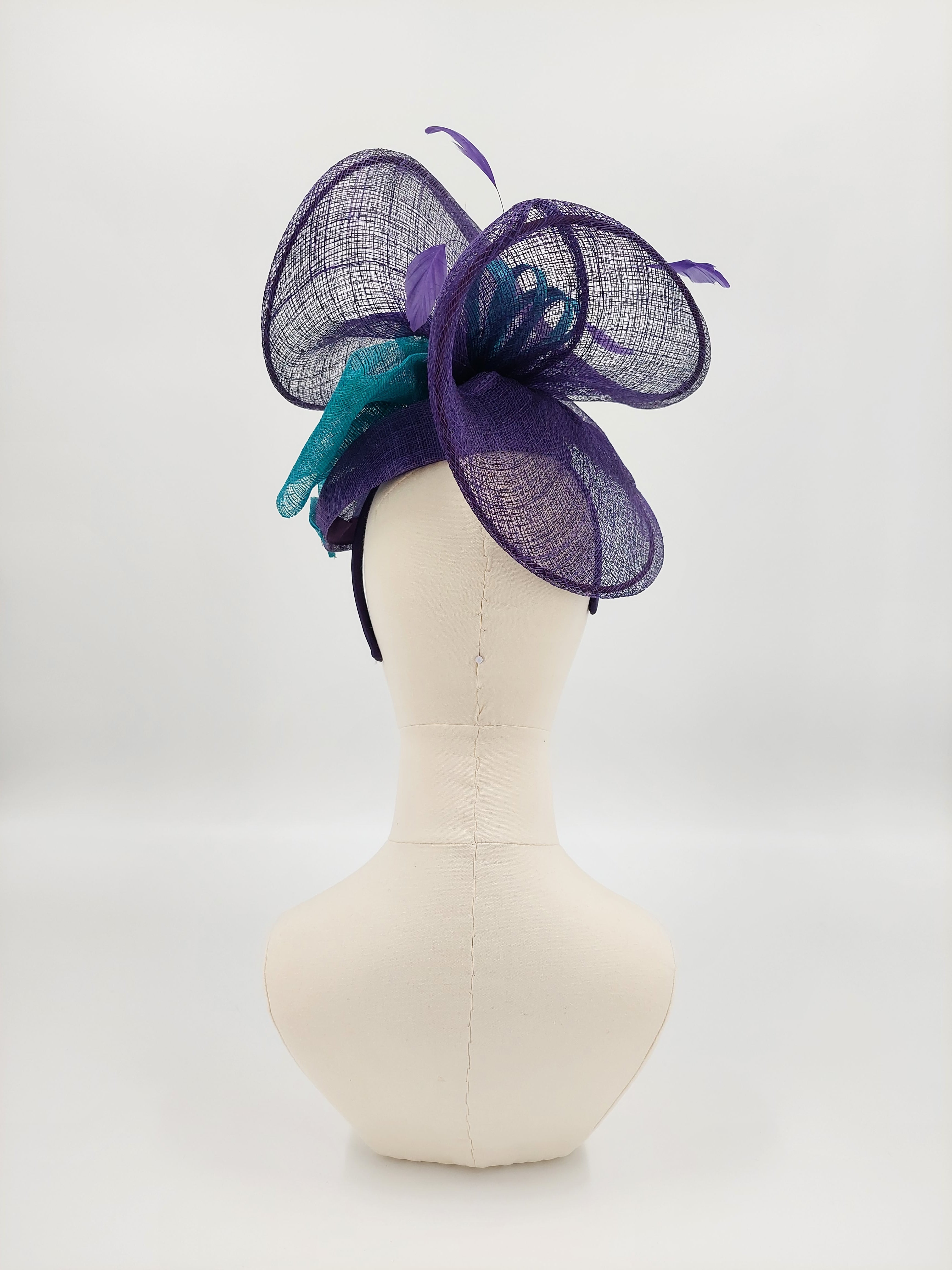 Purple wedding hats store and fascinators