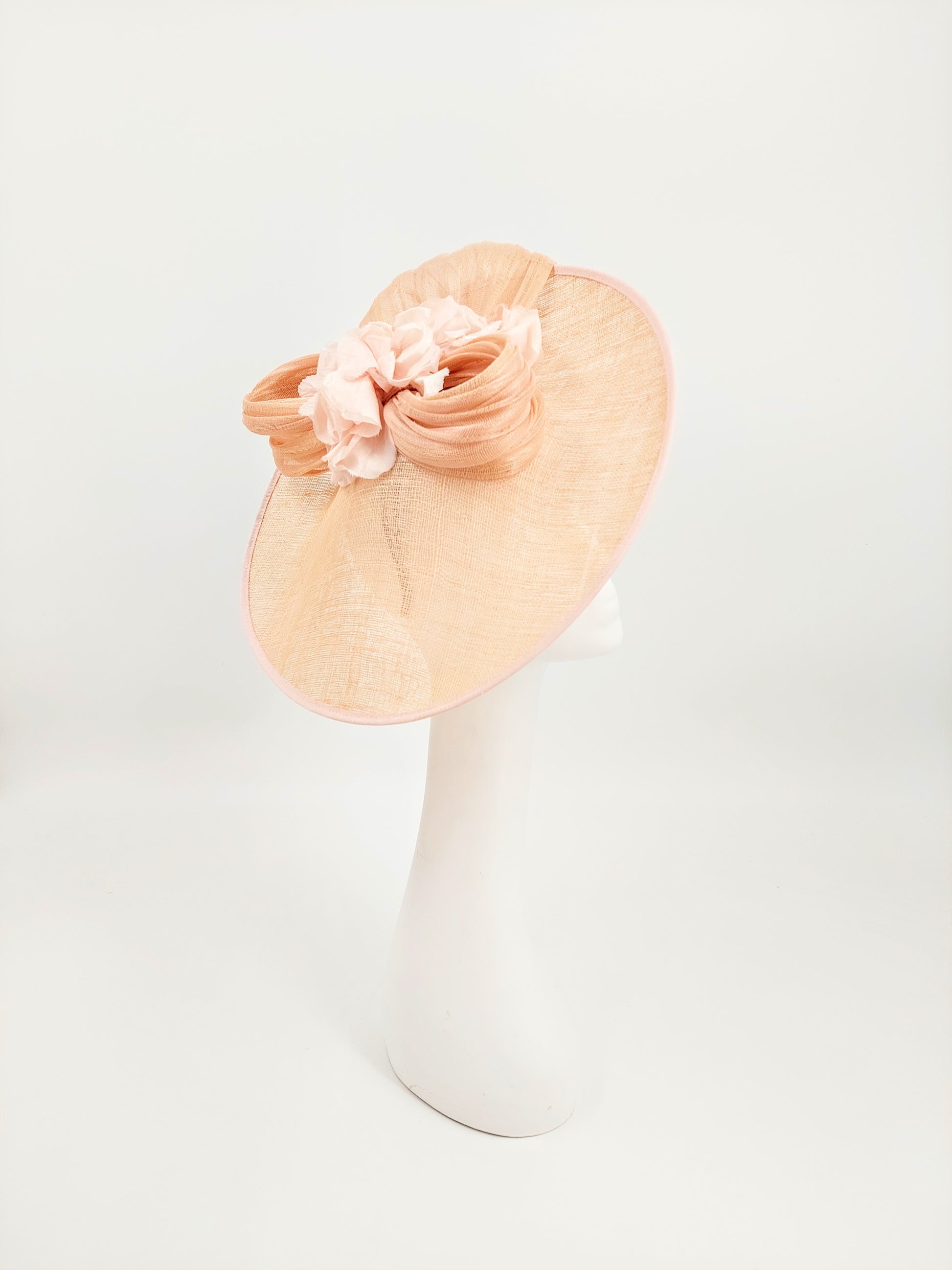 Hat Haven Millinery - Kentucky Derby Hats and Fascinators. Our headpieces are featured in the Official Kentucky Derby Style Guide. Visit our pop up shop at the Hyatt Regency Louisville during Derby week. Milliner, hat store in downtown Louisville. Handmade hats and fascinators.