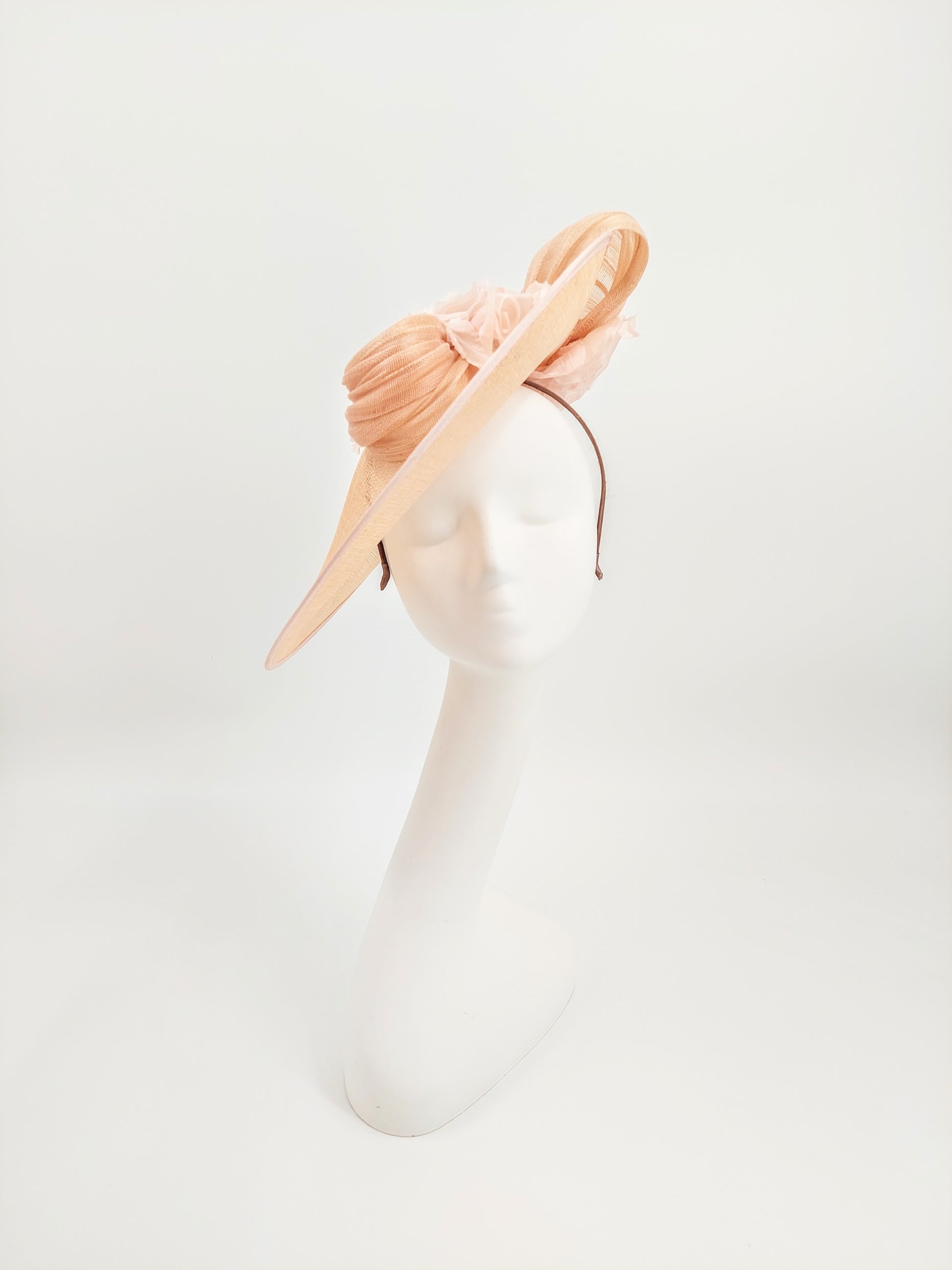 Hat Haven Millinery - Kentucky Derby Hats and Fascinators. Our headpieces are featured in the Official Kentucky Derby Style Guide. Visit our pop up shop at the Hyatt Regency Louisville during Derby week. Milliner, hat store in downtown Louisville. Handmade hats and fascinators.