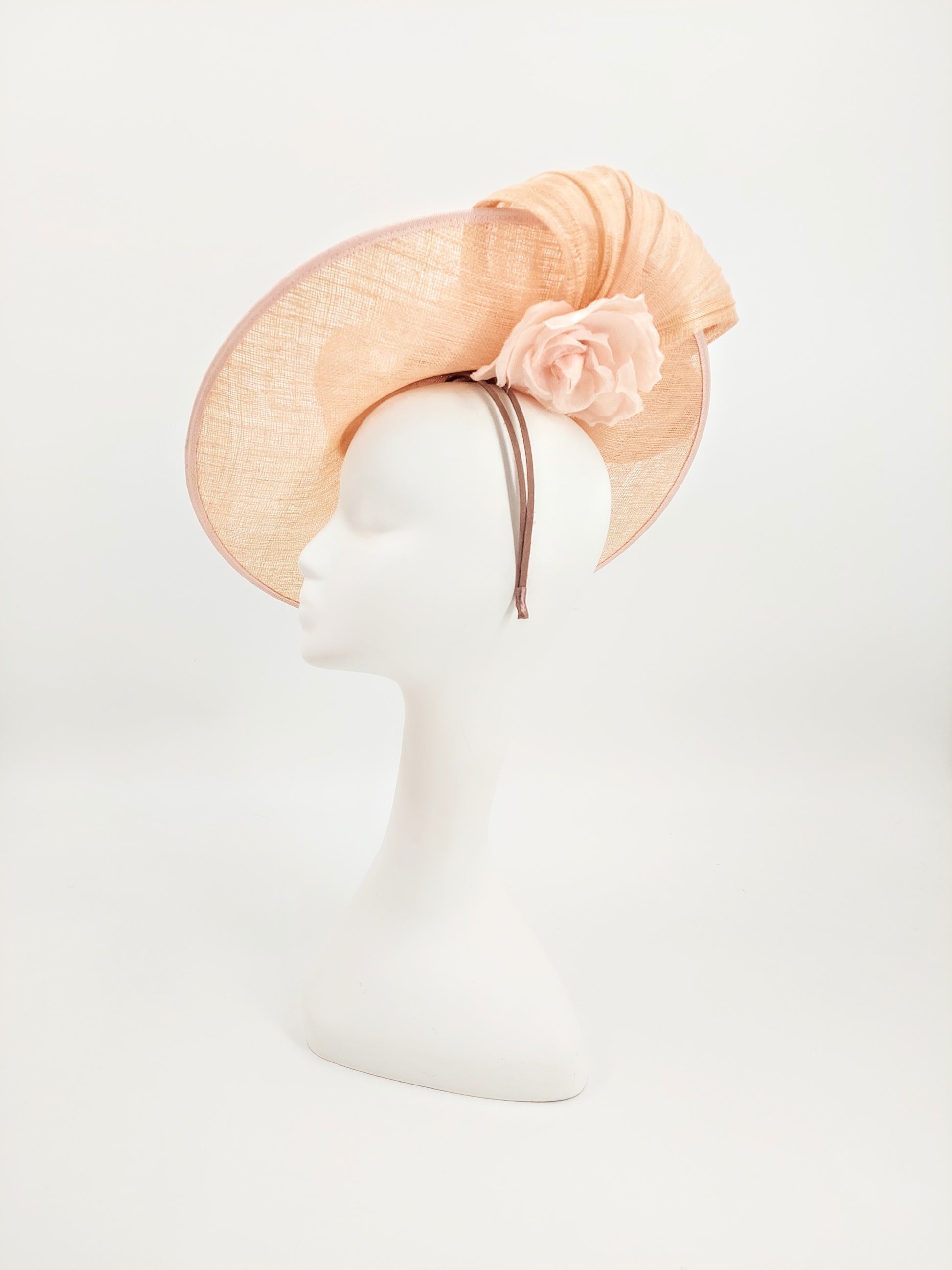 Hat Haven Millinery - Kentucky Derby Hats and Fascinators. Our headpieces are featured in the Official Kentucky Derby Style Guide. Visit our pop up shop at the Hyatt Regency Louisville during Derby week. Milliner, hat store in downtown Louisville. Handmade hats and fascinators.