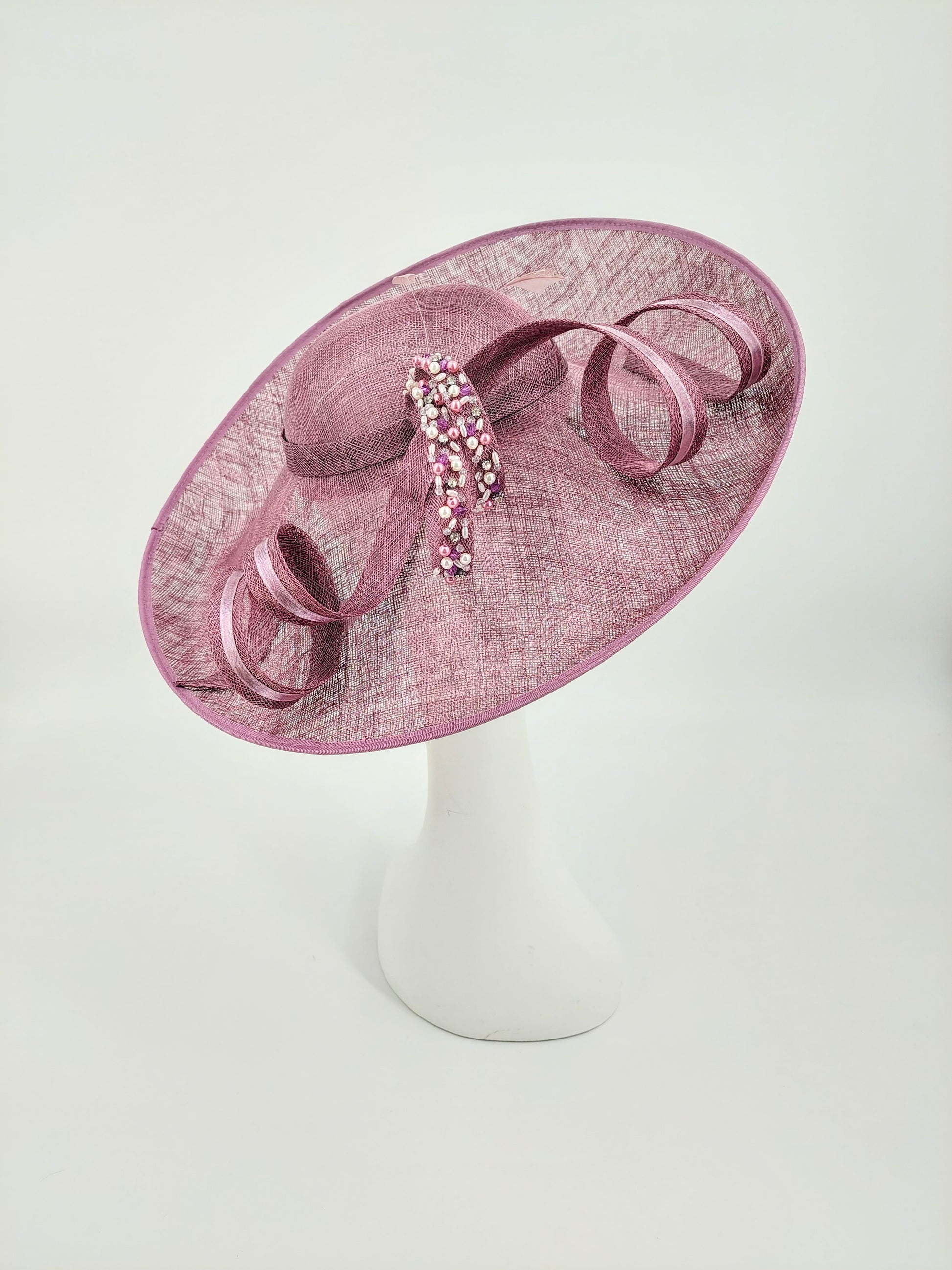 Hat Haven Millinery - Custom Kentucky Derby Hats & Fascinators. Visit our pop up shop during Derby week at the Hyatt Regency in Downtown Louisville. Official Milliner of the Kentucky Derby Museum 2025. Featured in the Churchill Downs Official Style Guide. Hand made in Louisville.