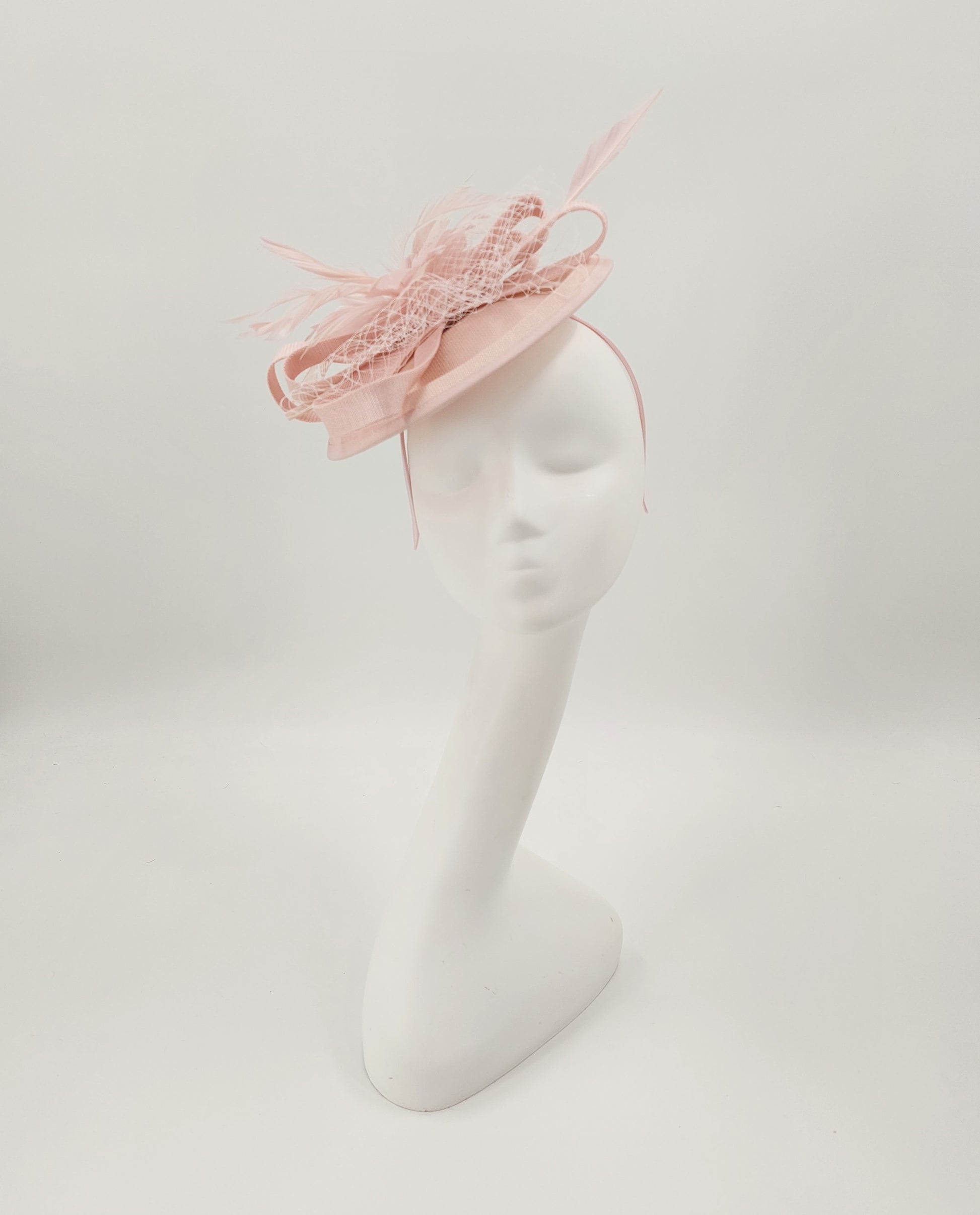 Hat Haven Millinery - An Official Milliner of the Kentucky Derby Museum, Seen in the Official Style Guide for the Kentucky Derby. Visit our pop up shop at the Hyatt Regency in Downtown Louisville during Derby week.