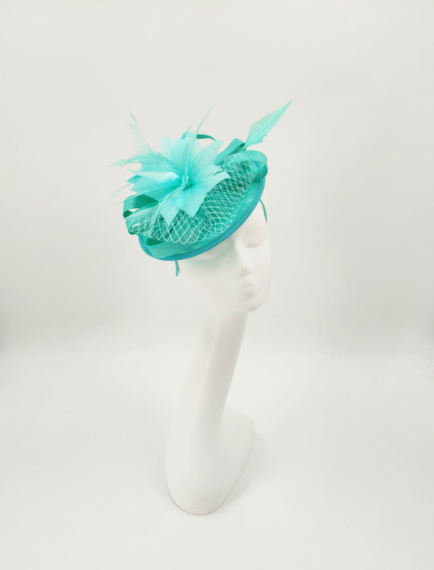 Hat Haven Millinery - An Official Milliner of the Kentucky Derby Museum, Seen in the Official Style Guide for the Kentucky Derby. Visit our pop up shop at the Hyatt Regency in Downtown Louisville during Derby week.