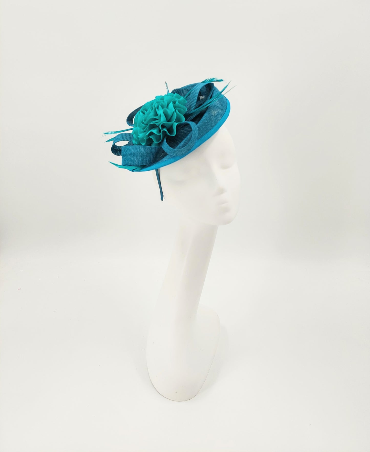 Hat Haven Millinery - An Official Milliner of the Kentucky Derby Museum, Seen in the Official Style Guide for the Kentucky Derby. Visit our pop up shop at the Hyatt Regency in Downtown Louisville during Derby week.