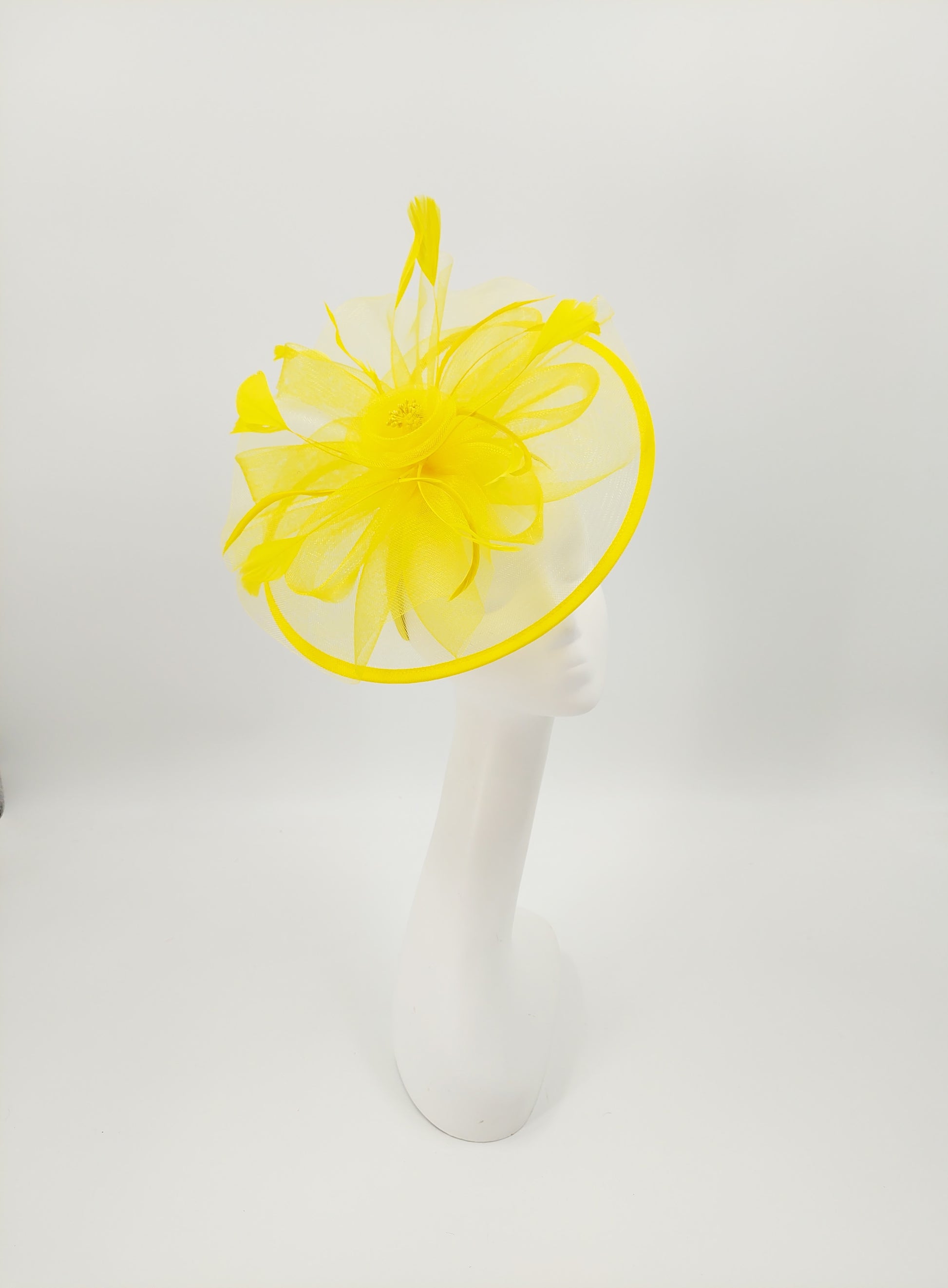 Hat Haven Millinery - An Official Milliner of the Kentucky Derby Museum, Seen in the Official Style Guide for the Kentucky Derby. Visit our pop up shop at the Hyatt Regency in Downtown Louisville during Derby week.