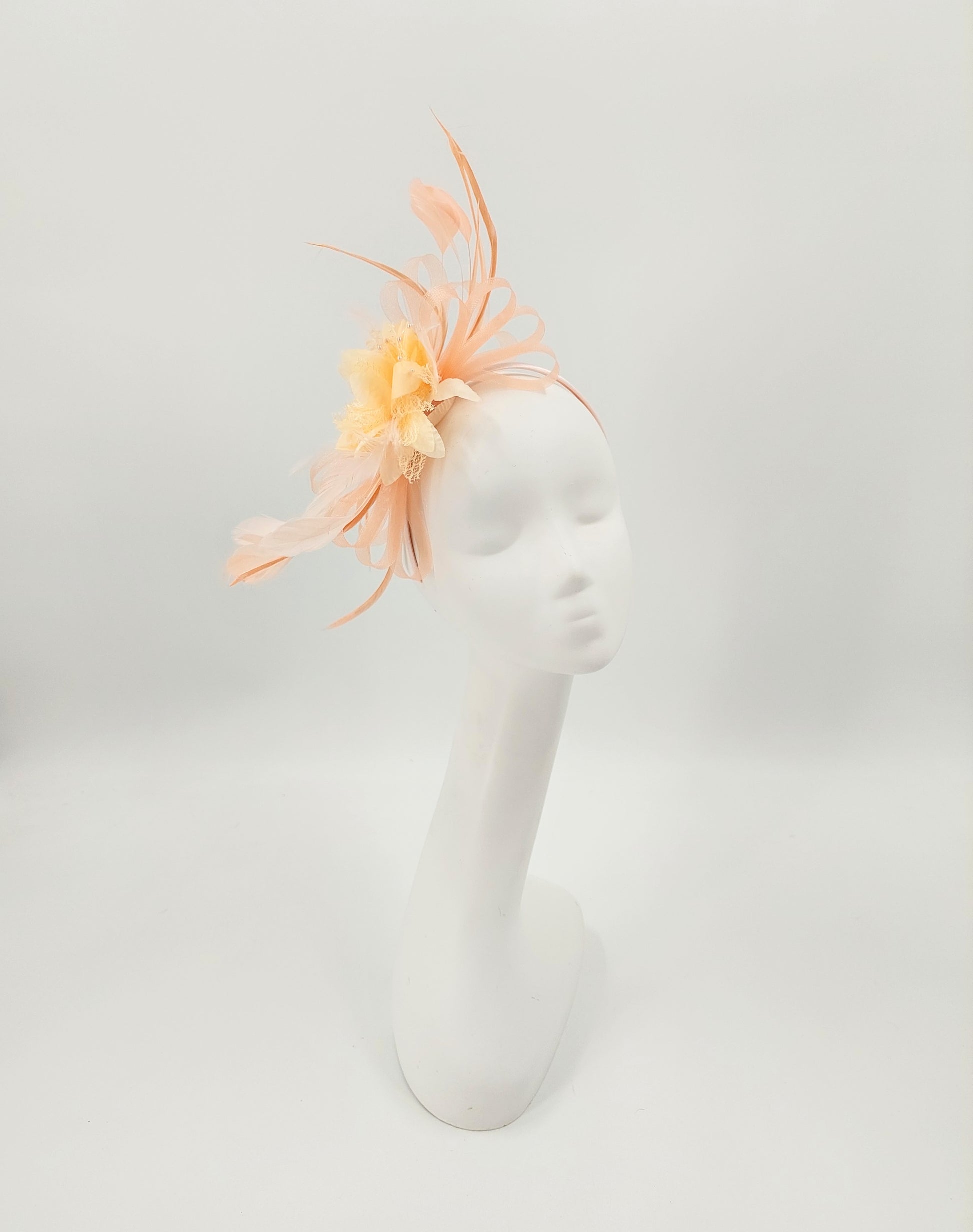 Hat Haven Millinery - An Official Milliner of the Kentucky Derby Museum, Seen in the Official Style Guide for the Kentucky Derby. Visit our pop up shop at the Hyatt Regency in Downtown Louisville during Derby week.