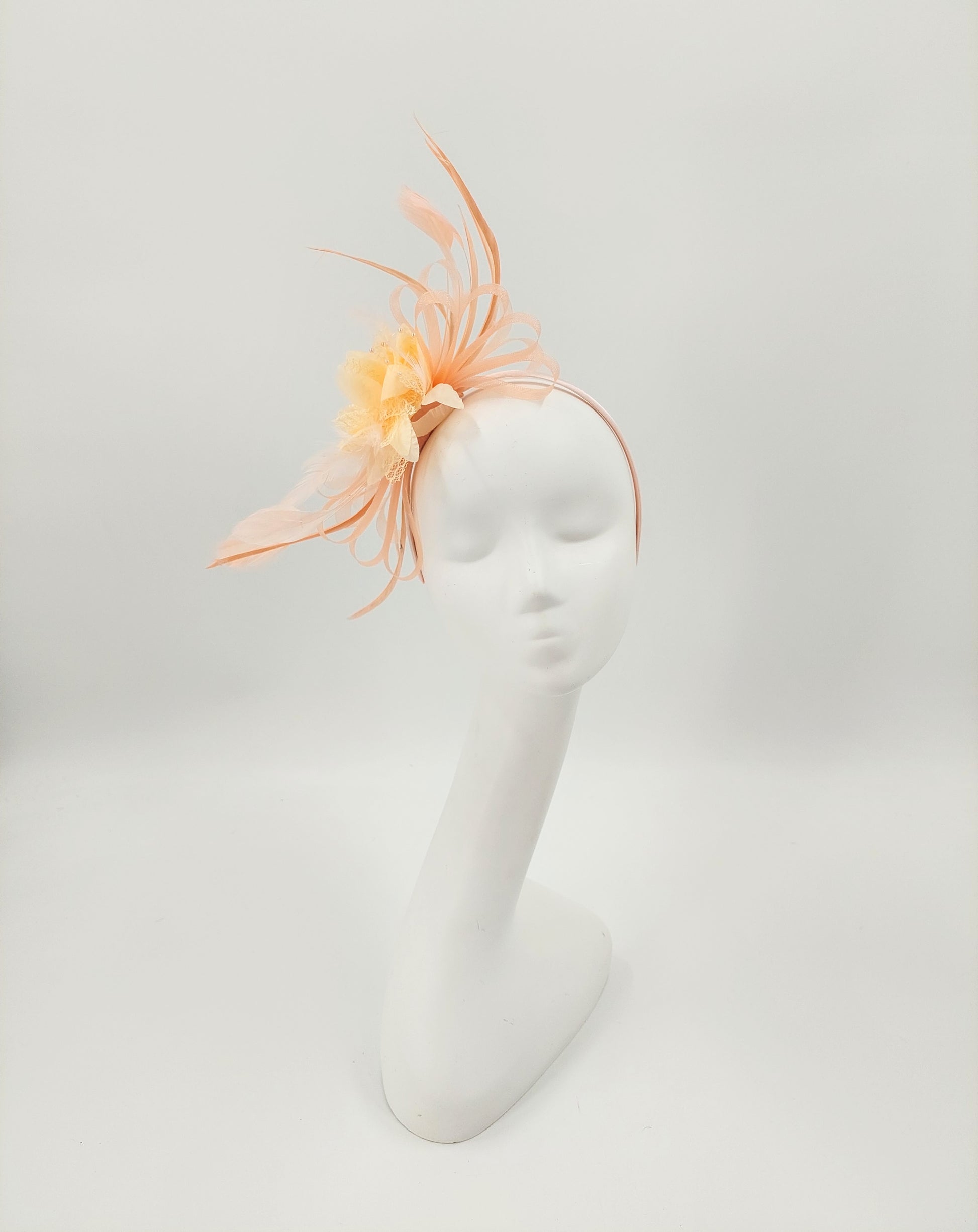 Hat Haven Millinery - An Official Milliner of the Kentucky Derby Museum, Seen in the Official Style Guide for the Kentucky Derby. Visit our pop up shop at the Hyatt Regency in Downtown Louisville during Derby week.