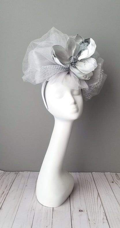 Silver fascinator, giant flower fascinator, Hat Haven Hat Shop in Louisville, Kentucky. Kentucky Derby hats, fascsinators, Ascot hats, Melbourne Cup hats, custom hats, millinery hat shop, derby hats, wedding hats, ladies dress hats, Kentucky Derby hats, hats Louisville, hat maker Louisville